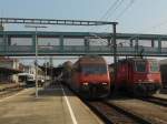 460 113-4 mit 420 169-5 der SBB und ein IC der DB am 13.08.2012 in Konstanz.