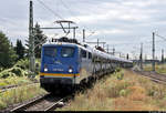 Autotransportzug mit 140 759-2 durchfährt den mittlerweile zurechtgestutzten Bahnhof Köthen auf Gleis 5 Richtung Magdeburg.