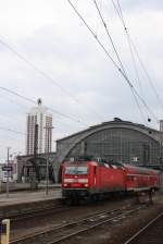 RE Saxonia (Leipzig-Dresden) bei der Ausfahrt in Leipzig mit 143 047-9 schon mit  Werbe Aufkleber  Frauen WM 09.03.2011