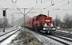 261 026 zog am 28.11.15 ihren Kalkzug nach Chemnitz-Küchwald durch Leipzig-Thekla Richtung Schönefeld.