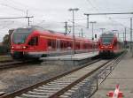 429 029 verlie am 25.September 2010 als RE 33313 Stralsund-Binz den Bahnhof Lietzow whrend rechts der 429 027 als RE 33263 Lietzow-Sassnitz noch warten mute bis 429 029 ausgefahren war.