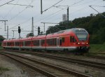 RE 13011 Rostock-Sassnitz,gefahren von 429 030,am 21.September 2011,bei der Ausfahrt aus Lietzow.