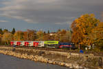 1116 195-9 mit ihrer Dosto Garnitur auf dem Bahndamm Lindau.