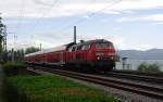 218 438-0 mit IRE 4236 hat gerade seinen Startbahnhof Lindau verlassen und befindet sich auf der Fahrt nach Stuttgart am 29.04.2012 auf dem Bodenseedamm.