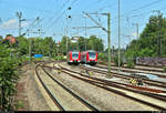 Blick auf die nördliche Ausfahrt des Bahnhofs Ludwigsburg mit abgestelltem 423 505-7 und 430 521 der S-Bahn Stuttgart.