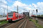 425 228-4 als S3 nach Germersheim am 24.05.14 kurz vor dem Halt in Ludwigshafen (Rhein) Hbf.