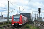 425 516-2 als RB44 nach Mainz Hbf am Nachmittag des 24.05.14 bei der Einfahrt in Ludwigshafen (Rhein) Mitte.