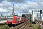 425 223-5 und 425 725-9 als S2 nach Kaiserslautern Hbf am Nachmittag des 24.05.14 bei der Einfahrt in Ludwigshafen (Rhein) Mitte.