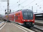 440 545-2 mit einer unbekannten RB bei der Einfahrt in Mnchen Hbf, 14.08.2010