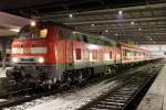 Die 218 404-2 mit der Bundesbahn RB nach Mhldorf in Mnchen HBF am 07.12.2012