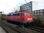 BR 115 steht im Bahnhof Neumüster.