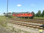 241 679 f�hrt mit CB 60961 von Rh�sa nach Coswig hier bei der Ausfahrt in Nossen am 6.August 2009.