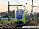 445 039-4 und 445 0?? (Bombardier Twindexx Vario) von DB Regio Schleswig-Holstein (DB Regio Nord) als RE 21031 (RE70) von Kiel Hbf nach Hamburg Hbf durchfahren den Bahnhof Pinneberg auf der