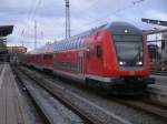 RE 4363 Rostock-Lutherstadt Wittenberg am 17.Dezember 2011 im Rostocker Hbf.Schublok war 112 118.