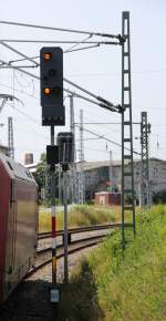 13.7.2013 Einfahrsig 557 Rostock Hbf aus Ri Stralsund.