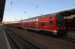 RE18491  Warnemünde-Express  von Warnemünde nach Berlin Hauptbahnhof (tief) steht am 18.9.2016 im Rostocker Hauptbahnhof.