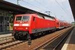 Hier 120 201-9 mit einem RE1 (RE4308)  Hanse-Express  von Rostock Hbf.