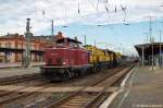 V 100 1041 (211 041-9) der NeSA Eisenbahn-Betriebsgesellschaft Neckar-Schwarzwald-Alb mbH mit einem kurzem Bauzug in Stendal.