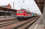 MEG 704 (155 195-1) Mitteldeutsche Eisenbahn GmbH mit einem Containerzug von Leipzig nach Hamburg in Stendal.