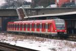 422 042-2 mit der S9 nach Essen in Wuppertal Steinbeck,6.2.2010.