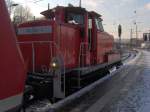 Eine BR 362 die an einem verschneitem Samstag Vormittag am ranngieren  ist im Aachener HBF.