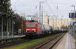 DB 143 827 vor Gterzug / Kesselwaggons am 28.11.2019 durch Anklam.