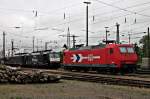 Am 02.05.2014 standen im nördlichen Bahnhofsbereich in Basel die HGK 2001 (145-CL 011) mit der ERS Railways ES 64 F4-208 und der ES 64 F4-201 von Freightiner PL. und warten auf ihre nächste Leistung.