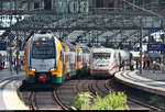 Während 402 010 (Tz 210  Fontanestadt Neuruppin ) als ICE 998 (Linie 13) von Frankfurt(Main)Hbf nach Berlin Ostbahnhof in Berlin Hbf abweichend auf Gleis 12 steht, verlässt 445 106-8 (Stadler KISS) der Ostdeutschen Eisenbahn GmbH (ODEG) als RE 63971 (RE2) von Cottbus Hbf nach Wismar das Gleis 13.
[1.8.2019 | 11:26 Uhr]
