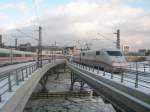 Hier 402 019-4  Hagen  und 402 016-0  Dessau  als ein ICE10 von Kln Hbf. und Kln/Bonn Flughafen nach Berlin Ostbahnhof, bei der Ausfahrt am 3.2.2010 aus Berlin Hbf.