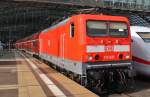 Hier 114 021 mit einem RE1 von Berlin Charlottenburg nach Frankfurt(Oder), bei der Ausfahrt am 25.2.2012 aus Berlin Hbf.