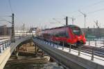 Hier 442 330-7  Dessau-Roßlau  als RE7 (RE18718) von Dessau Hbf. nach Wünsdorf-Waldstadt, bei der Ausfahrt am 26.1.2013 aus Berlin Hbf. 