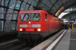 Hier 143 058-6 mit einer RB14 (RB18927) von Nauen nach Berlin Schönefeld Flughafen, dieser Zug stand am 16.2.2013 in Berlin Hbf.