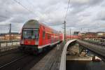 Hier eine RB14 (RB18925) von Nauen nach Berlin Schönefeld Flughafen, bei der Ausfahrt am 15.3.2014 aus Berlin Hbf. Zuglok war 143 812-6.