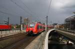 Hier 442 325-7 als RB14 (RB18925)  Airport-Express  von Nauen nach Berlin Schönefeld Flughafen, bei der Ausfahrt am 14.6.2014 aus Berlin Hbf.