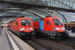 Hier links 182 025-7 mit einem RE1 (RE18183) von Brandenburg Hbf. nach Frankfurt(Oder) und rechts 182 011 mit einem RE1 (RE18178) von Frankfurt(Oder) nach Brandenburg Hbf., diese beiden Züge begegneten sich am 6.4.2015 in Berlin Hbf.