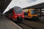 Hier links 442 644-1 und 442 139-2 als RE7 (RE94714) von Berlin Lichtenberg nach Wnsdorf-Waldstadt und rechts VT650.60  Frankfurt(Oder)  und VT650.58 als RB60 (RB79549) von Berlin Lichtenberg nach