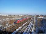 RE 4 nach Lutherstadt Wittenberg kurz nach Ausfahrt aus Berlin-Schnefeld Flughafen am 22.1.2006.
