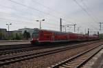 Hier ein RE7 (RE18255) von Wünsdorf-Waldstadt nach Berlin Zoologischer Garten, bei der Einfahrt am 30.4.2012 in Berlin Schönefeld Flughafen.