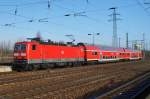 Hier 143 360 mit einer RB14 (RB18562) von Senftenberg nach Berlin Schönefeld Flughafen, bei der Einfahrt am 6.2.2013 in Berlin Schönefeld Flughafen.