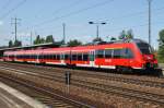 Hier 442 326-5 als RB14 (RB18565) von Berlin Schönefeld Flughafen nach Senftenberg, bei der Ausfahrt am 6.7.2013 aus Berlin Schönefeld Flughafen.