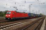 Hier 185 392-8 mit einem KLV-Zug, bei der Durchfahrt am 14.7.2014 durch Berlin Schönefeld Flughafen, in Richtung Genshagener Heide.