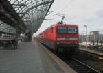 Hier 114 023-5 mit einem RE4 von Ludwigsfelde nach Wittenberge, bei der Ausfahrt am 1.4.2010 aus Berlin Spandau.