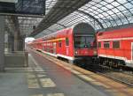 Hier eine RB10 von Nauen nach Berlin Charlottenburg, bei der Einfahrt am 8.7.2011 in Berlin Spandau.