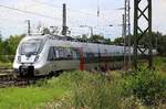 Nachschuss auf 1442 304 (Bombardier Talent 2) von DB Regio Südost als RE 16106 (RE13) von Leipzig Hbf nach Magdeburg Hbf, der den Bahnhof Biederitz verlässt.