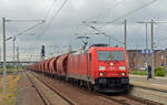 185 221 rollt mit einem Kalizug am 24.06.18 durch Bitterfeld Richtung Halle/Leipzig.