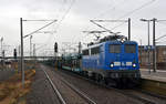 140 007 (140 825) der Press führte am 17.03.19 einen leeren Autozug durch Bitterfeld Richtung Leipzig.