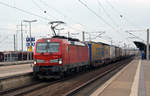 193 332 führte am 24.03.19 einen Schenker-KLV-Zug durch Bitterfeld Richtung Halle(S).