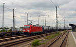 145 026 erreicht mit einem Kesselwagenzug am 14.07.19 Bitterfeld.