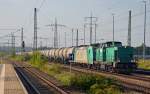 293 514 alias Grüner Klaus schob am 30.08.14 in Bitterfeld 185 533 vor einen Kesselwagenzug. Bei der Lok handelt es sich um einen Neuzugang der RBB.