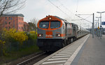 V 330.4 der hvle führte am Abend des 09.04.16 einen Schüttgutzug durch Bitterfeld Richtung Norden.